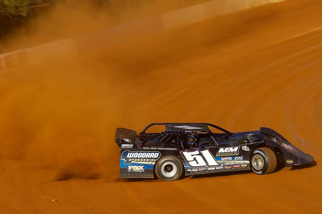 Late model dirt track racing — car #51 throwing dirt