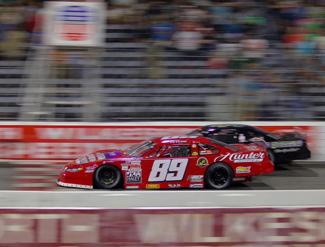 Car #89 at speed with motion blur background